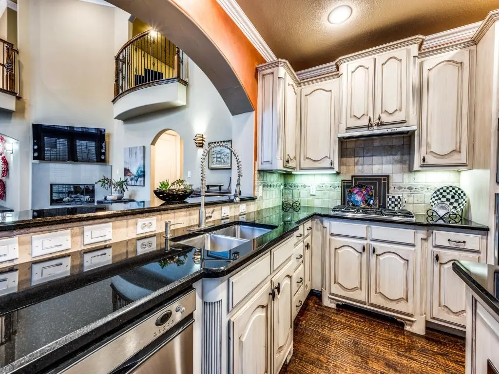 Kitchen with island and view to living room