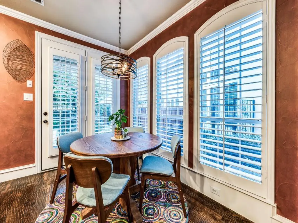 Breakfast nook with arched windows