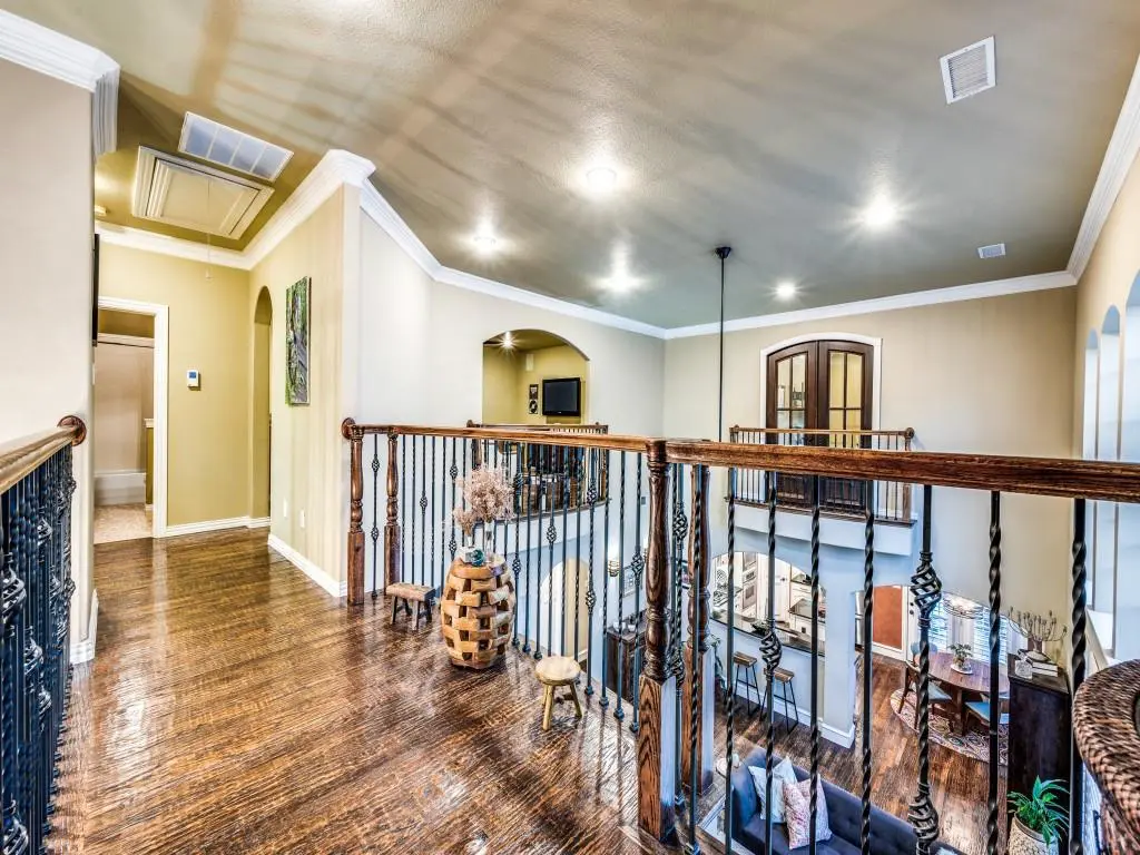 Upper-level landing with iron railing